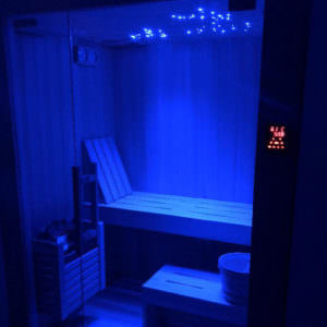 INDOOR SPA WITH SOPHISTICATED DESIGN IN PEAR WOOD WITH PANORAMIC GLASSES
